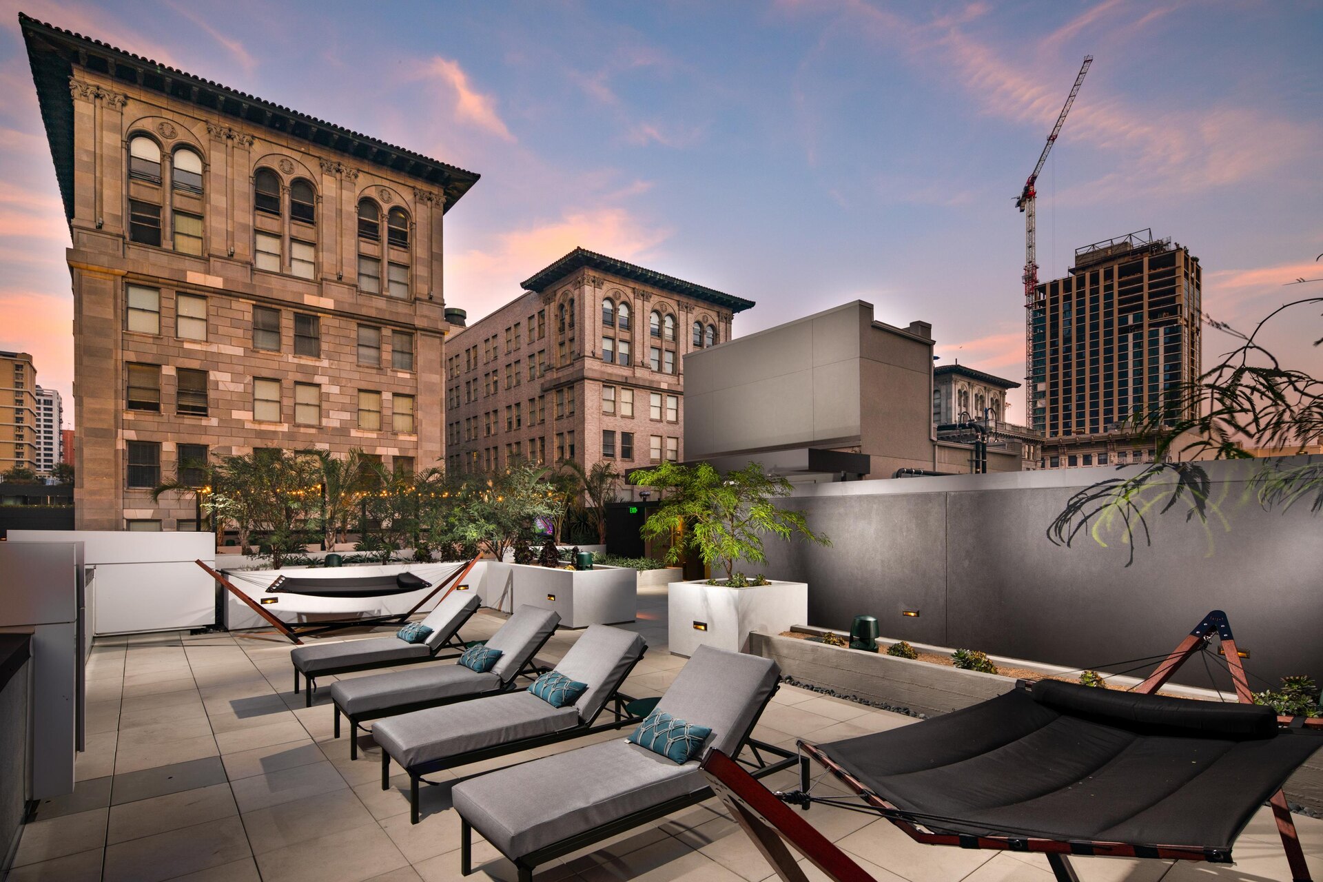 Rooftop sundeck with hammocks and lounge chairs